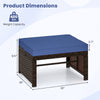 Navy cushion top of a PE rattan ottoman footstool, 400 lbs capacity, ideal for outdoor patio or garden use.