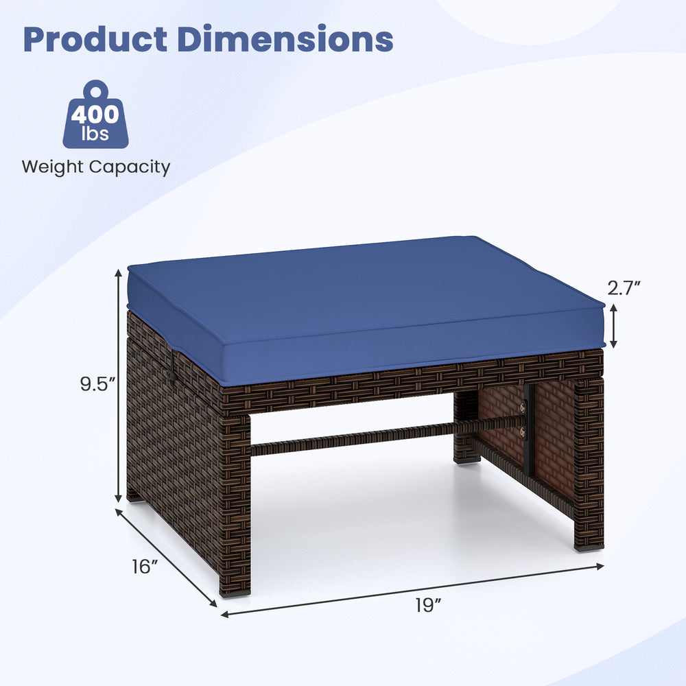 Navy cushion top of a PE rattan ottoman footstool, 400 lbs capacity, ideal for outdoor patio or garden use.