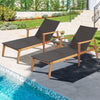 Patio chaise lounge and side table set in brown PE wicker with acacia wood frame, perfect for poolside relaxation.