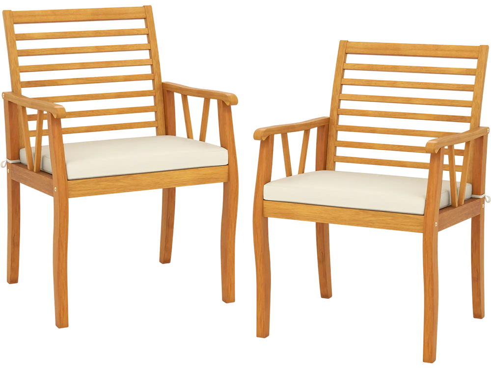 Two acacia wood patio dining chairs with removable white cushions, perfect for outdoor bistro conversations.