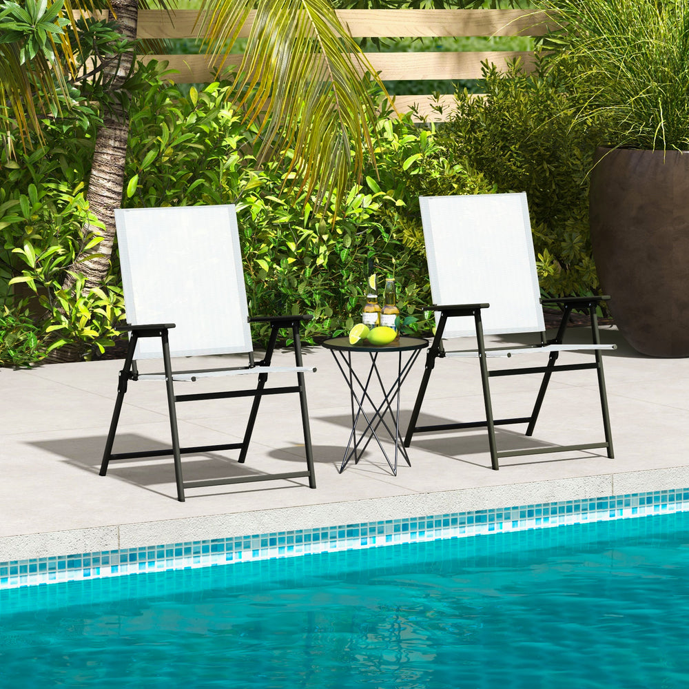 Two white patio folding chairs with armrests by the pool, featuring a sturdy metal frame and portable design for.