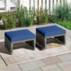 Two navy blue PE rattan ottomans with soft zippered cushions, ideal for outdoor seating or as coffee tables on the.
