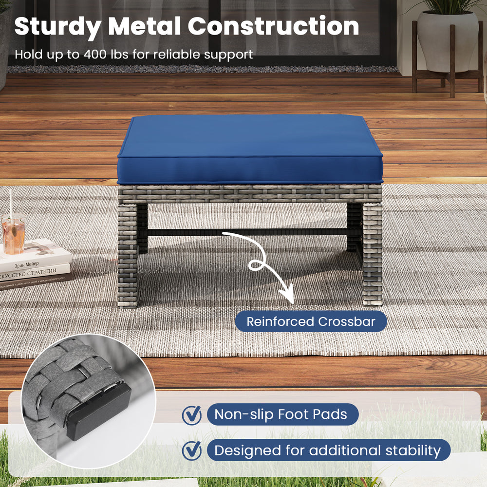Navy PE rattan ottoman with soft zippered cushion, sturdy metal construction, designed for outdoor patio use.