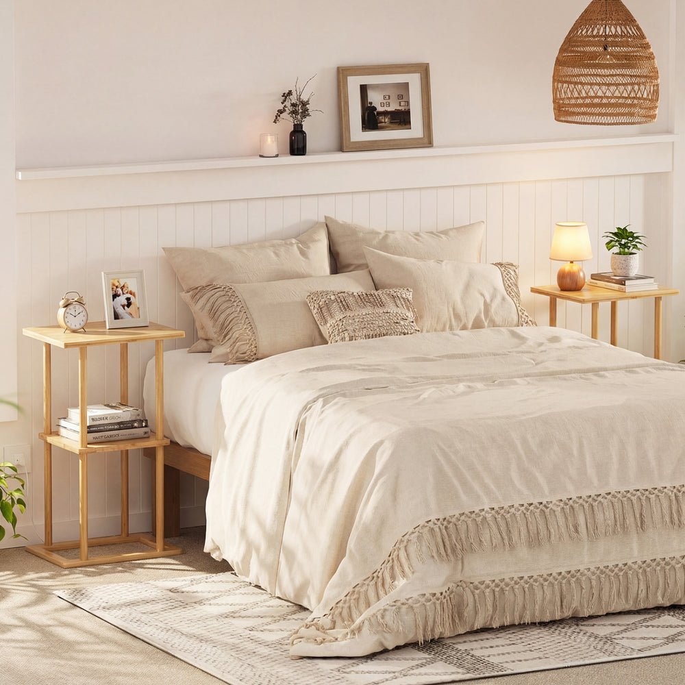 Natural bamboo side tables with storage shelves, perfect for bedroom organization and stylish decor.