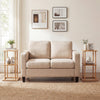 Natural bamboo side table with storage shelves, featuring a sturdy base and versatile design for living room use.