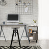 Modern wooden nightstand set with legs, featuring a smooth surface and asymmetrical design, ideal for small spaces.