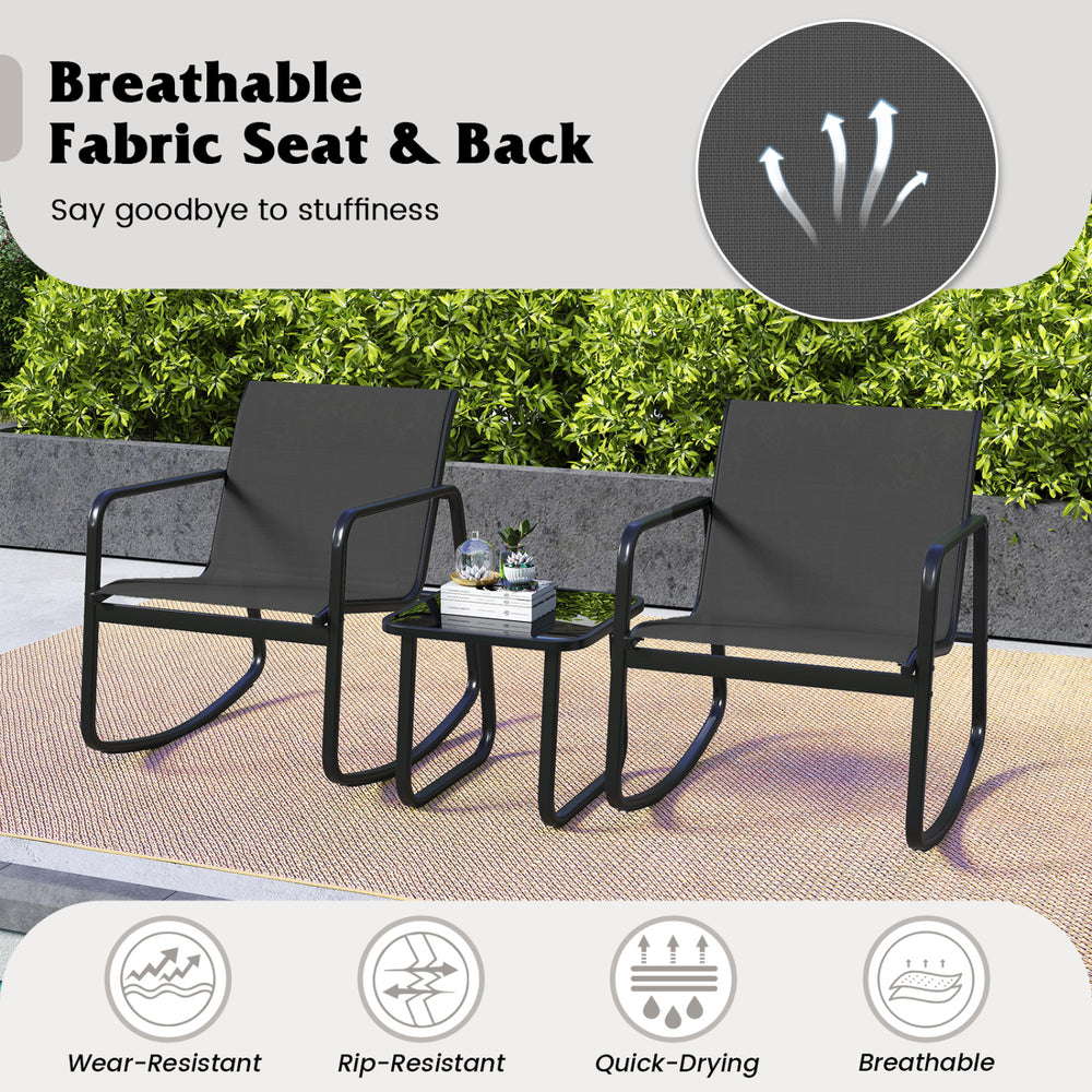 Two black rocking bistro chairs with a glass-top table, featuring breathable fabric seats for outdoor relaxation.