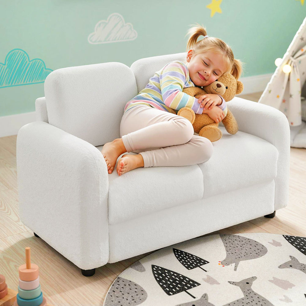 White 2-seat kids sofa with soft teddy fleece upholstery, perfect for toddlers to relax in a playroom or bedroom.