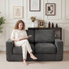 Cozy 2-seater floor couch in black corduroy with removable cover, perfect for relaxing in small spaces.