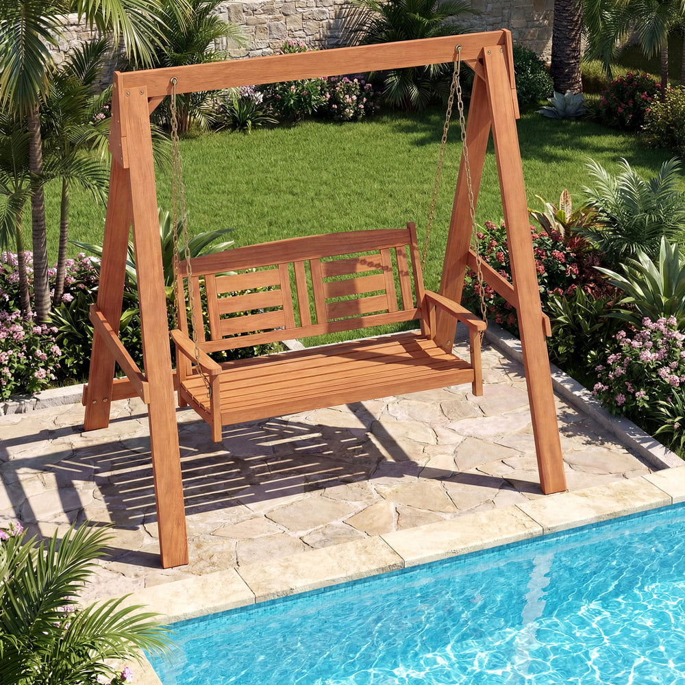 2-seater porch swing with stand in hardwood, featuring adjustable chains, set by the poolside for outdoor relaxation.