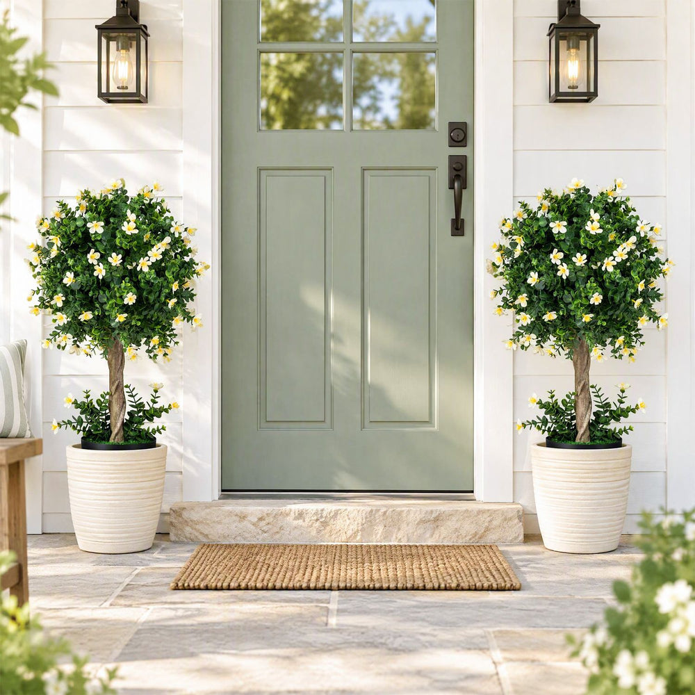 Two 26-inch artificial topiary trees with white blossoms in weighted pots, perfect for front porches and home decor.