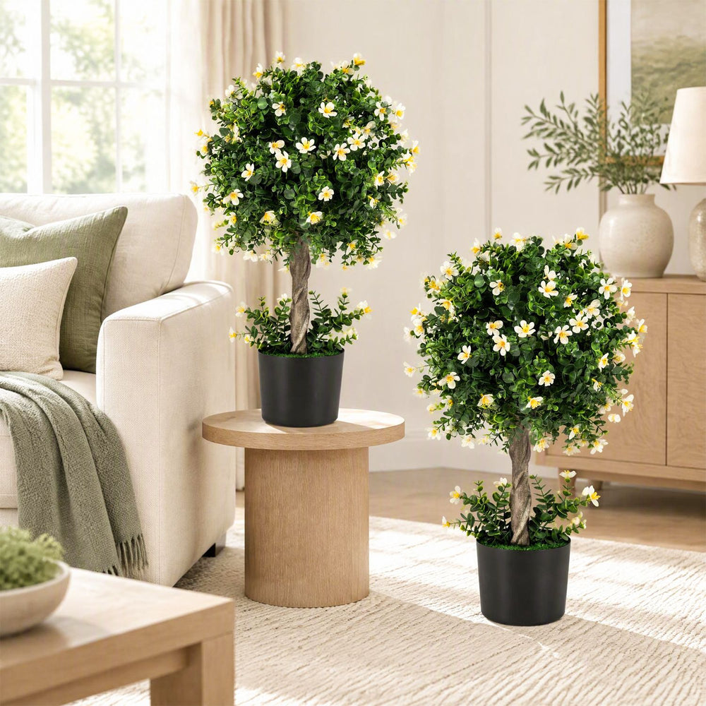 Single 26-inch artificial topiary tree with white blossoms in a sturdy pot, ideal for adding charm to any indoor space.