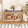 2-tier bamboo shoe bench with gray padded cushion, featuring a slatted shelf for ample shoe storage in entryway.