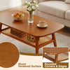 2-tier boho rattan coffee table with rounded corners, wood veneered surface, and open shelf for stylish living room use.