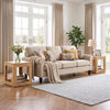 Farmhouse end table with natural wood grain, featuring a 2-tier design for storage beside a cozy sofa.