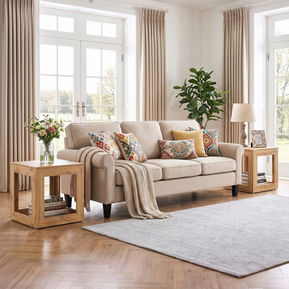 Farmhouse end table with natural wood grain, featuring a 2-tier design for storage beside a cozy sofa.