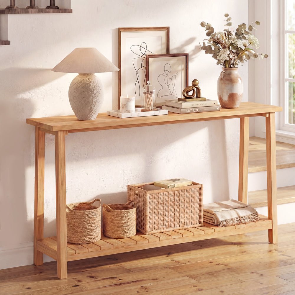 2-tier farmhouse sofa table with teak wood frame, showcasing a lamp and decorative items, ideal for living room storage.