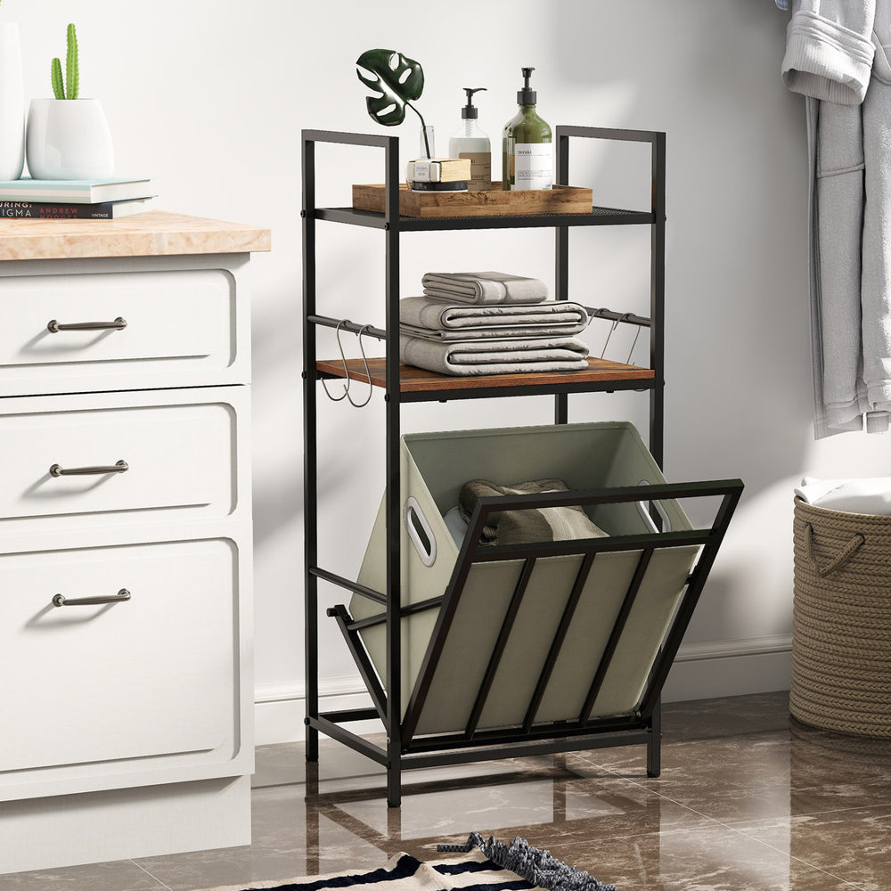 2-tier laundry hamper with tilt-out basket in black, featuring shelves for towels and storage in a modern design.