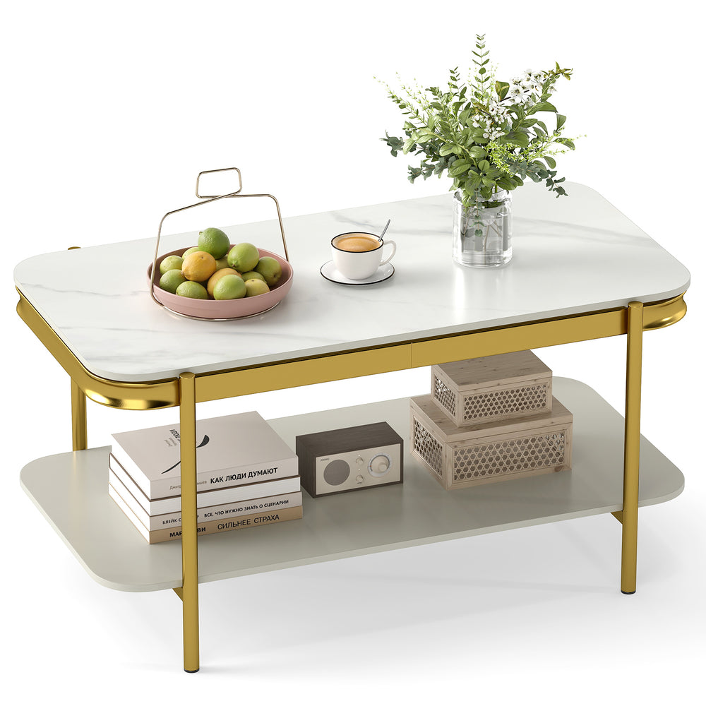 Close-up view of the sintered stone top on a modern rectangular coffee table with a gold metal frame and open shelf.