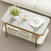 Modern rectangular coffee table with sintered stone top, gold metal frame, and open storage shelf for stylish living.