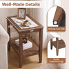 Walnut 2-tier narrow side table with tempered glass top and open storage shelf, shown in a living room setting.