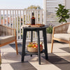 Eucalyptus wood side table in black features a slatted tabletop and storage shelf, perfect for outdoor patio use.