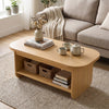 Natural 2-tier oval coffee table with bottom storage shelf, featuring rounded edges and minimalist design for living.
