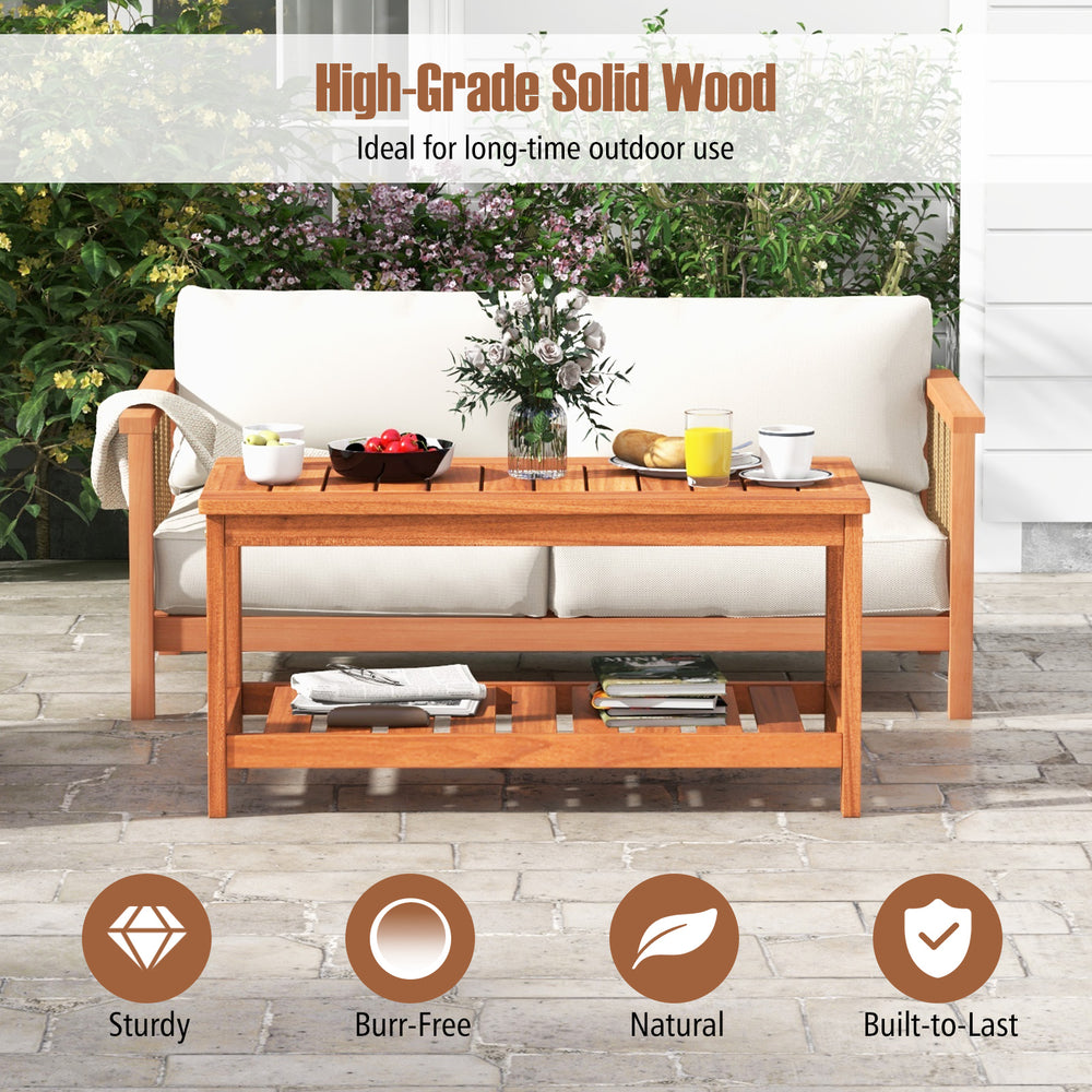 2-tier patio coffee table made of solid wood with slatted tabletop and shelf, ideal for outdoor use and storage.