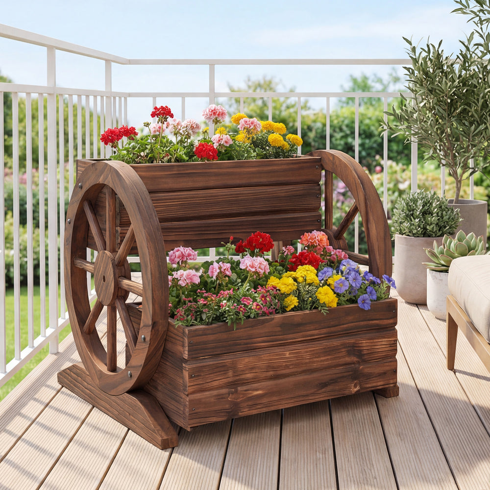 Rustic wood 2-tier raised garden bed in wagon shape, featuring drainage holes and vibrant flowers for outdoor decor.