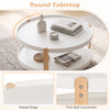 Round coffee table with solid beech wood legs, featuring a raised edge and open storage shelf for organized living room use.