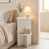 Round white side table with dual-layer storage shelf, perfect for small spaces and easy to clean for bedroom use.