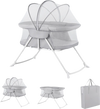 2-in-1 baby bassinet in grey with breathable mesh, foldable design, and rocking motion for safe bedside sleeping.