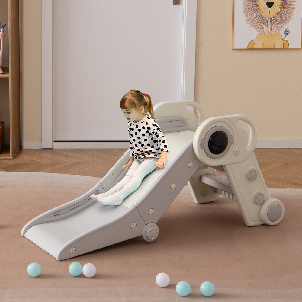 Toddler sliding down the 2 in 1 baby slide with climber in gray, designed for safe and exciting play for ages 18+.