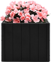 Black 2-in-1 outdoor umbrella base planter with pink flowers, designed for 6-10 ft patio umbrellas, featuring rolling.