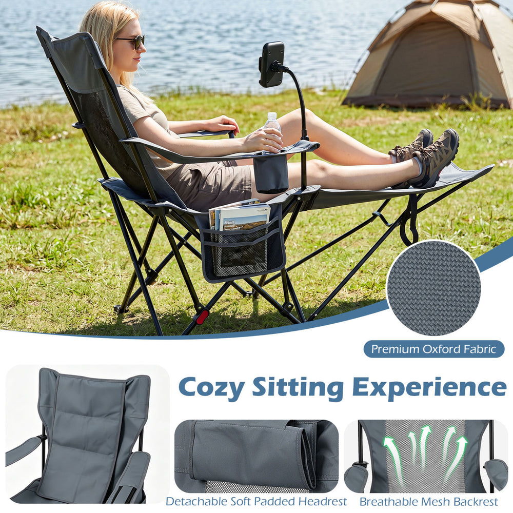 Reclining camping chair in gray with detachable footrest, adjustable backrest, and breathable mesh backrest for comfort.