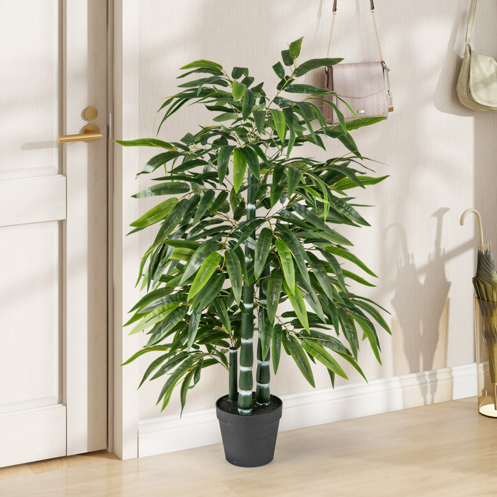 Fake bamboo tree with vibrant leaves and PE bamboo trunk, perfect for home or office decor.