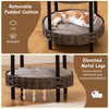 2-tier rattan cat nest with removable gray padded cushion and elevated metal legs for added ventilation and comfort.