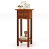 Slim brown nightstand with a drawer and open shelf, made of acacia wood, perfect for bedroom or living room use.