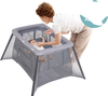 Portable baby playpen in dark gray, designed for infants 0-9 months, featuring safety mesh and padded mattress for.