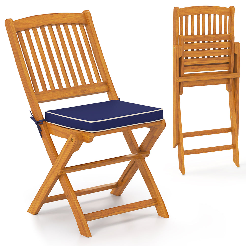 Set of 2 outdoor folding chairs in acacia wood with navy seat cushions, ideal for picnics and camping.