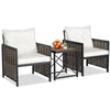 Two comfortable patio chairs with white cushions and a stylish acacia wood tabletop, perfect for outdoor relaxation.