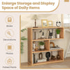 Concave 3-shelf open bookshelf in geometric design, ideal for displaying books and decorations in living room or office.