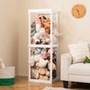 Large white stuffed animal storage with open top and elastic cords, ideal for organizing toys in a kid's room.