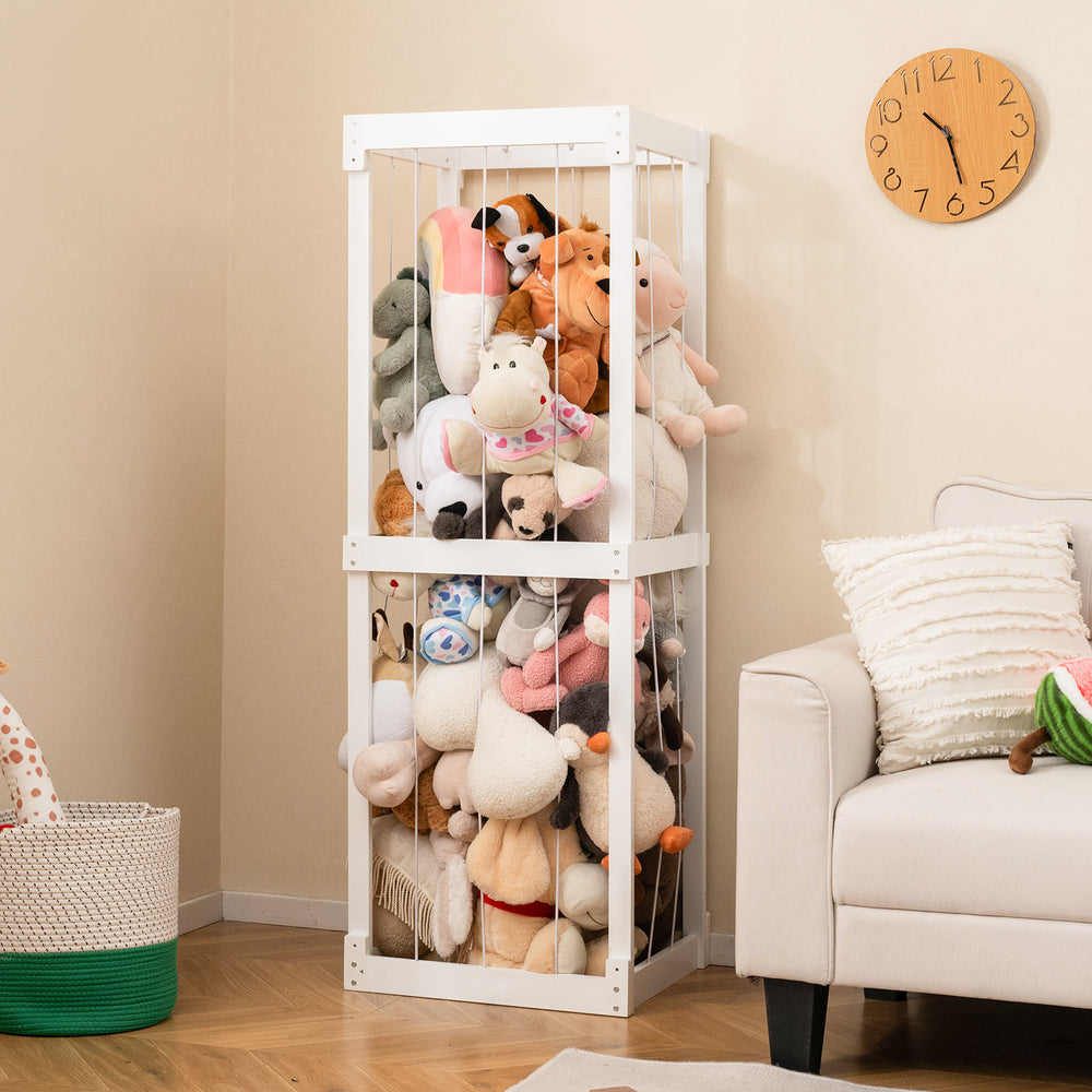 Large white stuffed animal storage with open top and elastic cords, ideal for organizing toys in a kid's room.