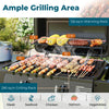 Ample grilling area of 290 sq.in with skewers, steak, and vegetables on a propane gas grill with warming rack.