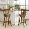Single brown bar stool showcasing a curved PE rattan backrest and rubber wood frame, designed for ergonomic comfort.
