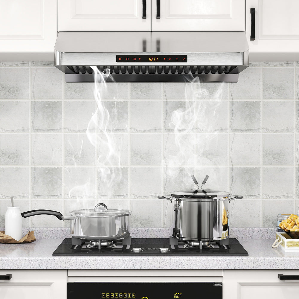 30-inch stainless steel under cabinet range hood with 900 CFM airflow, featuring two pots and steam rising on a kitchen.