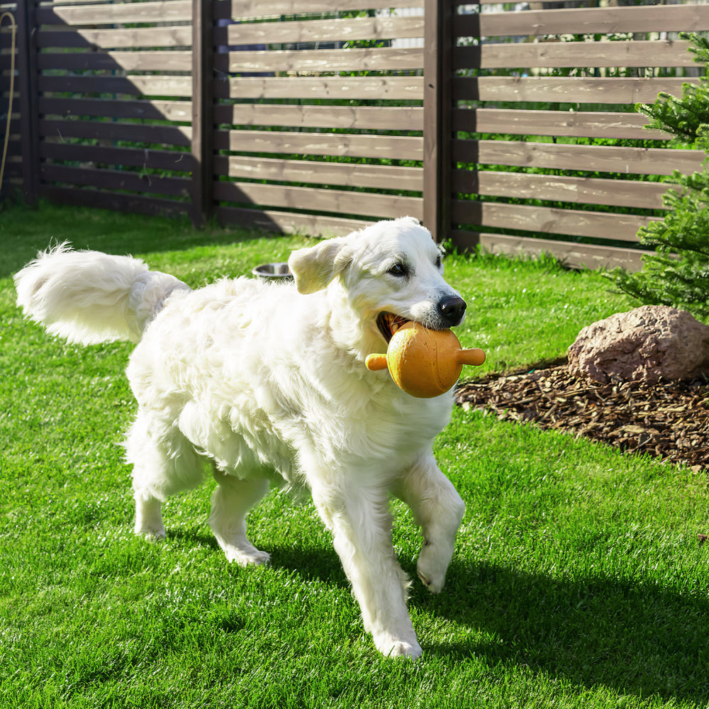 Interlocking artificial grass tiles in a lush green setting, perfect for maintenance-free indoor and outdoor use.