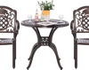 Round 31.5-inch cast aluminum patio dining table with umbrella hole, featuring elegant design for outdoor use.