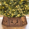 Rustic 31.5" Christmas tree collar features antler cutouts, designed for easy setup and compatibility with various artificial trees.